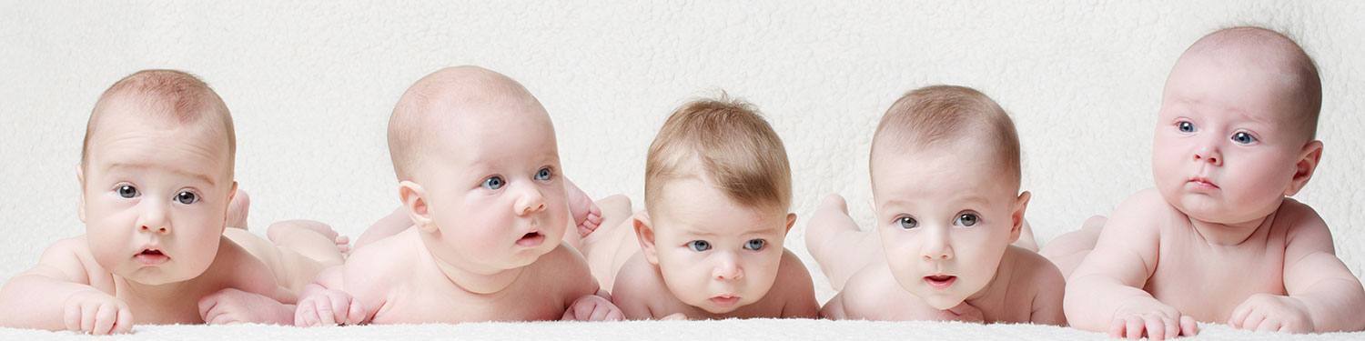Five Babies on Carpet